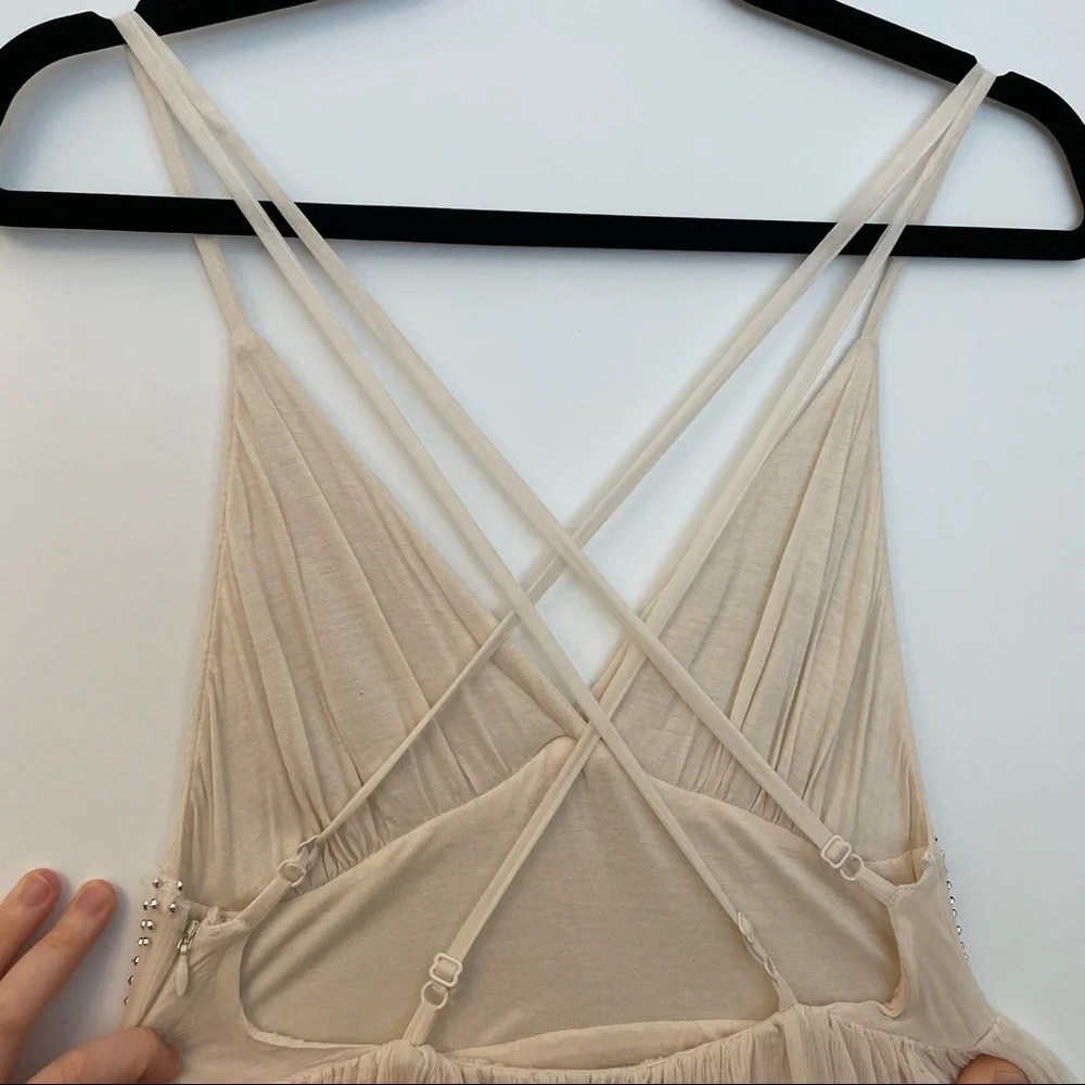 Free People Cream sparkly mini dress with a strappy back!
Size: 2 Never worn! - Picture 4 of 4